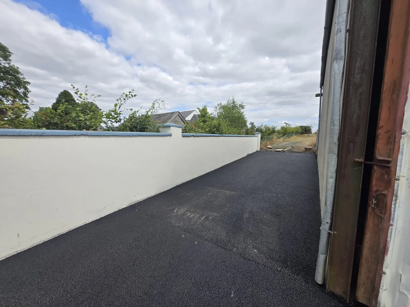 Wide Asphalt Driveway project by Allsurface Groundworks in County Laois